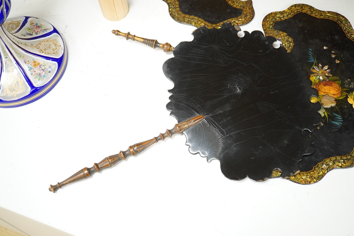 Three early Victorian papier maché hand screens, two with abalone inlay, 39cm in length